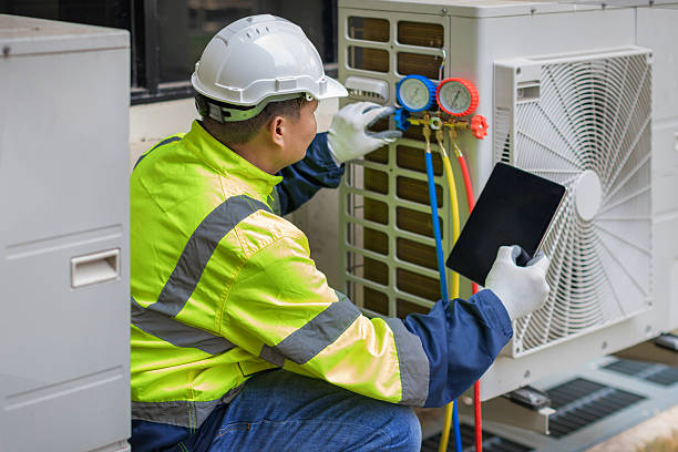Professional Heat Pump Repair technician working in Pilot Mountain, NC